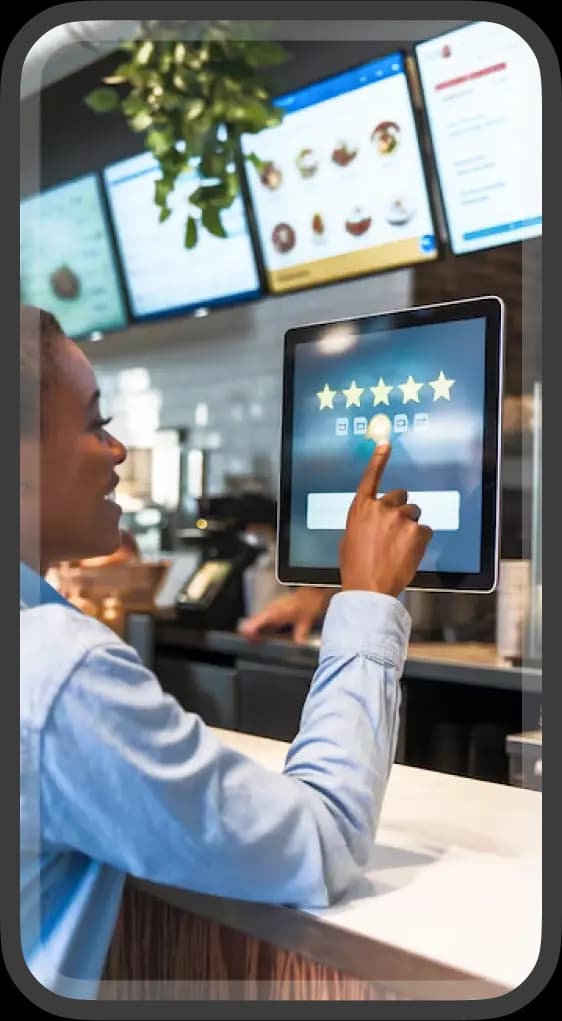a woman rating 5 stars on a customer service machine